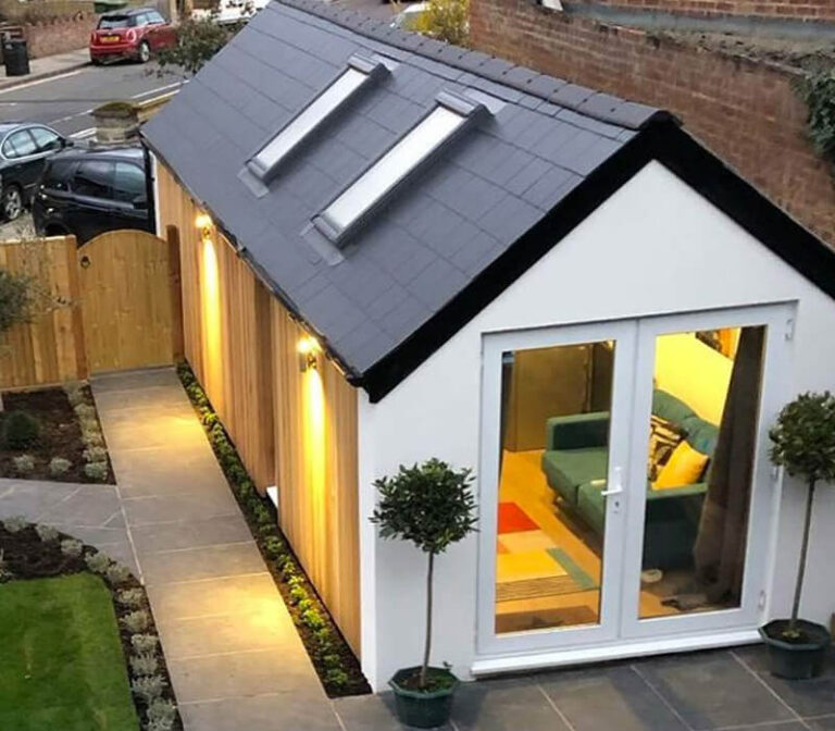 Finished outdoor room created from converted garage space